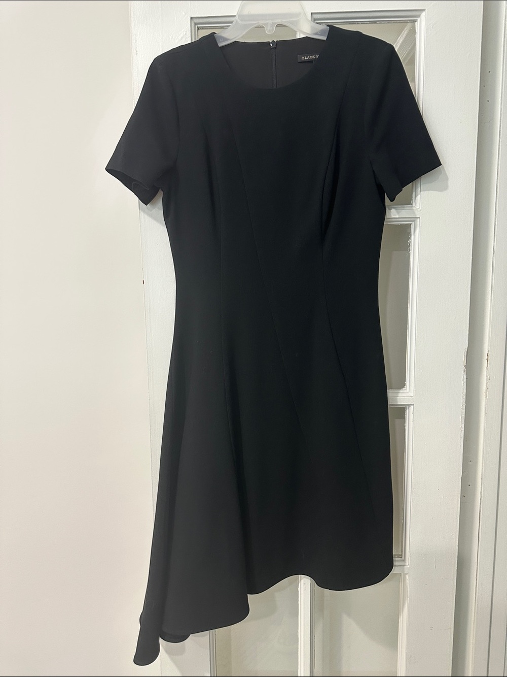 Black Halo Black Short-Sleeve Dress w Asymmetrical Hemline.